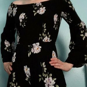 A Floral Romper with a Cross Back